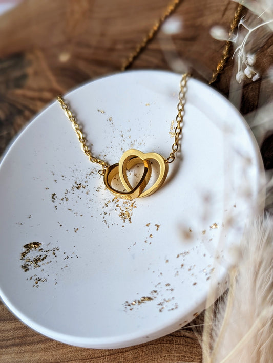 Intertwined hearts necklace